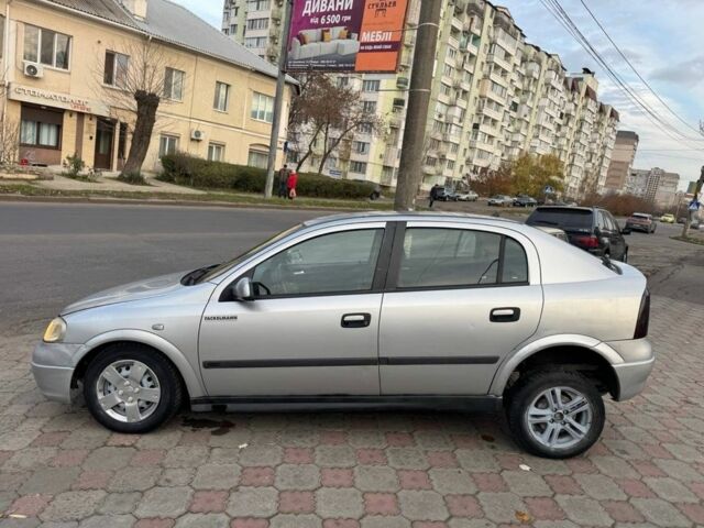 Серый Опель Астра, объемом двигателя 1.7 л и пробегом 300 тыс. км за 899 $, фото 5 на Automoto.ua