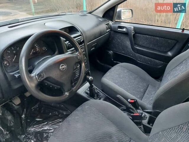 Серый Опель Астра, объемом двигателя 2 л и пробегом 350 тыс. км за 2500 $, фото 3 на Automoto.ua