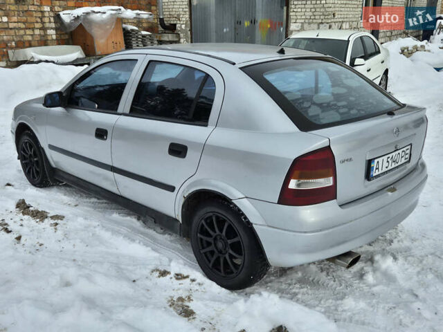 Серый Опель Астра, объемом двигателя 1.2 л и пробегом 290 тыс. км за 2250 $, фото 1 на Automoto.ua