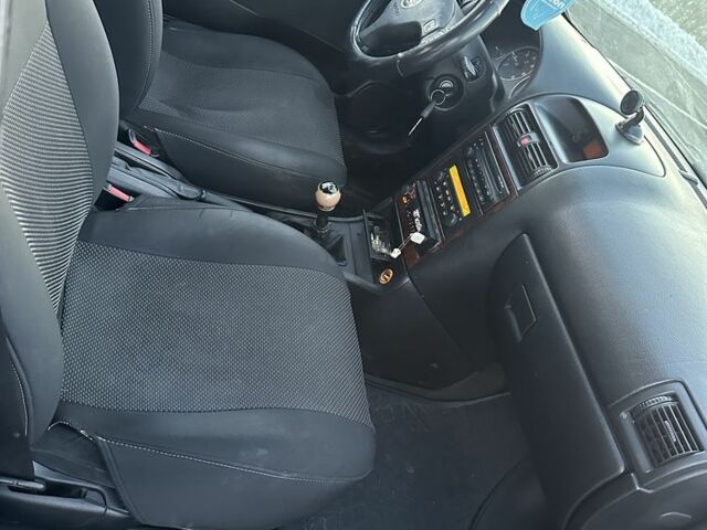 Серый Опель Астра, объемом двигателя 1.7 л и пробегом 240 тыс. км за 2600 $, фото 8 на Automoto.ua