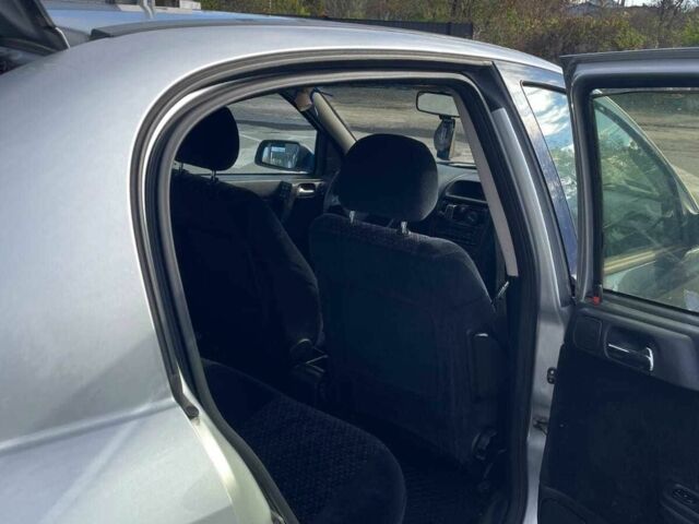 Серый Опель Астра, объемом двигателя 2 л и пробегом 288 тыс. км за 1400 $, фото 12 на Automoto.ua