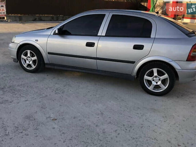 Серый Опель Астра, объемом двигателя 1.6 л и пробегом 244 тыс. км за 3000 $, фото 3 на Automoto.ua