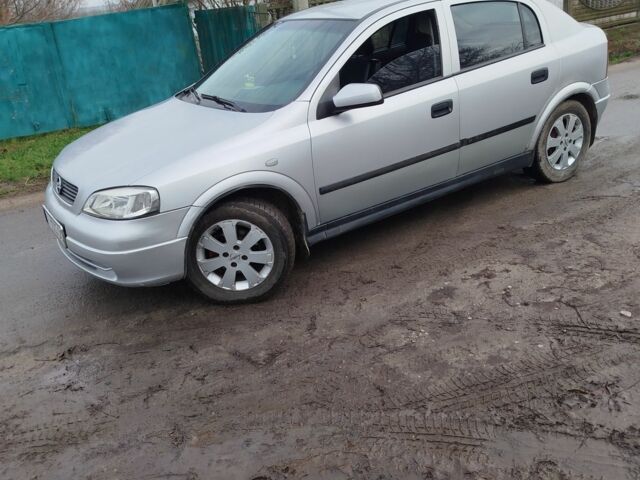 Серый Опель Астра, объемом двигателя 1.2 л и пробегом 249 тыс. км за 2400 $, фото 4 на Automoto.ua