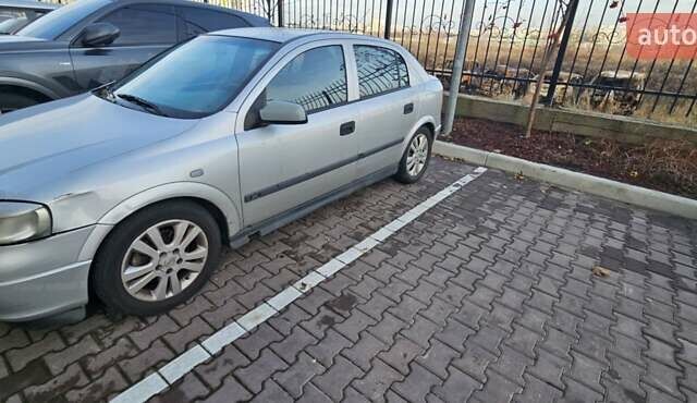 Серый Опель Астра, объемом двигателя 2.2 л и пробегом 267 тыс. км за 2900 $, фото 2 на Automoto.ua