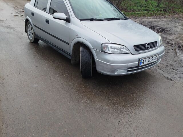 Серый Опель Астра, объемом двигателя 1.2 л и пробегом 249 тыс. км за 2400 $, фото 6 на Automoto.ua