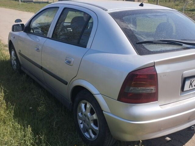 Серый Опель Астра, объемом двигателя 1.6 л и пробегом 200 тыс. км за 1919 $, фото 5 на Automoto.ua