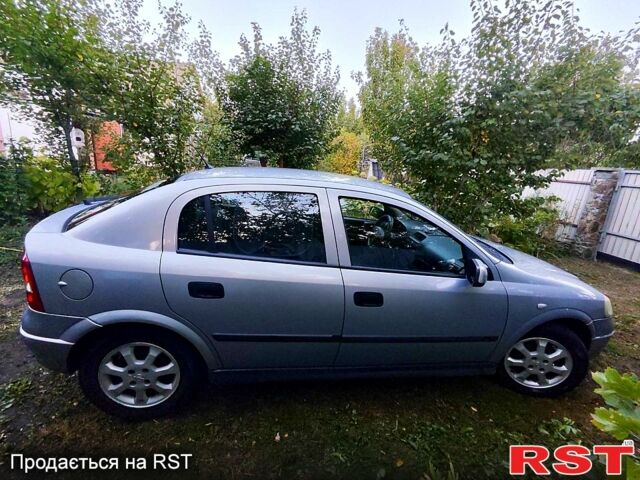 Серый Опель Астра, объемом двигателя 1.6 л и пробегом 180 тыс. км за 4730 $, фото 2 на Automoto.ua