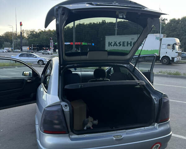 Серый Опель Астра, объемом двигателя 1.6 л и пробегом 242 тыс. км за 3900 $, фото 8 на Automoto.ua