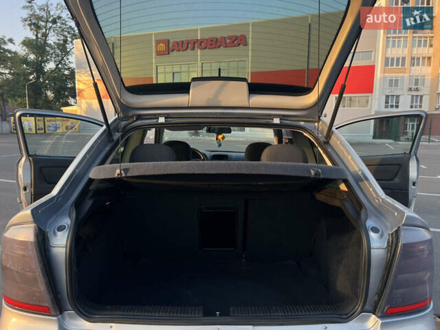 Серый Опель Астра, объемом двигателя 1.6 л и пробегом 242 тыс. км за 3900 $, фото 15 на Automoto.ua