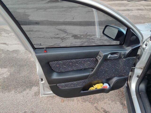 Серый Опель Астра, объемом двигателя 1.6 л и пробегом 288 тыс. км за 3900 $, фото 12 на Automoto.ua