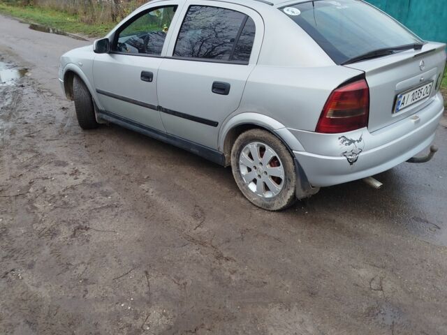 Серый Опель Астра, объемом двигателя 1.2 л и пробегом 249 тыс. км за 2400 $, фото 3 на Automoto.ua