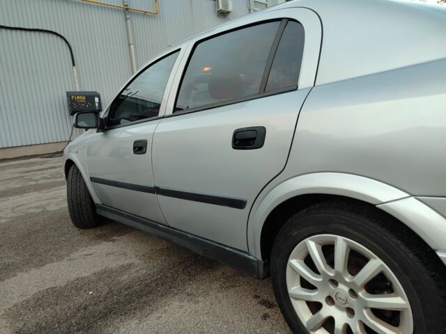 Серый Опель Астра, объемом двигателя 1.6 л и пробегом 288 тыс. км за 3900 $, фото 7 на Automoto.ua