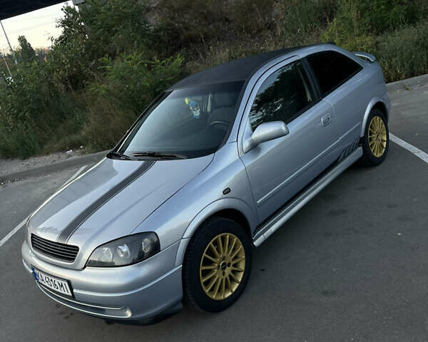 Серый Опель Астра, объемом двигателя 1.6 л и пробегом 242 тыс. км за 3900 $, фото 2 на Automoto.ua