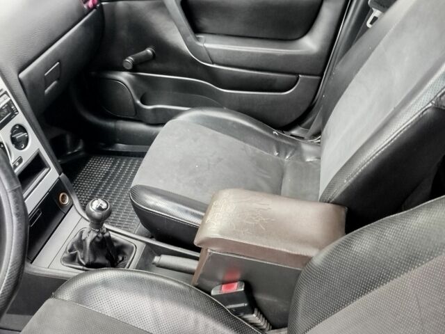 Серый Опель Астра, объемом двигателя 1.2 л и пробегом 249 тыс. км за 2400 $, фото 10 на Automoto.ua