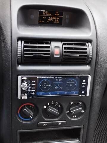 Серый Опель Астра, объемом двигателя 1.6 л и пробегом 239 тыс. км за 3800 $, фото 5 на Automoto.ua