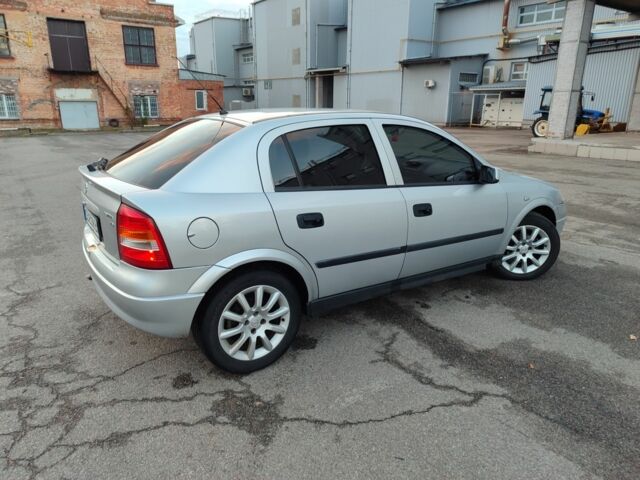 Серый Опель Астра, объемом двигателя 1.6 л и пробегом 288 тыс. км за 3900 $, фото 9 на Automoto.ua