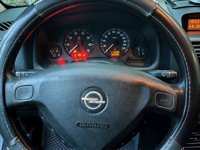 Серый Опель Астра, объемом двигателя 1.6 л и пробегом 180 тыс. км за 4730 $, фото 7 на Automoto.ua