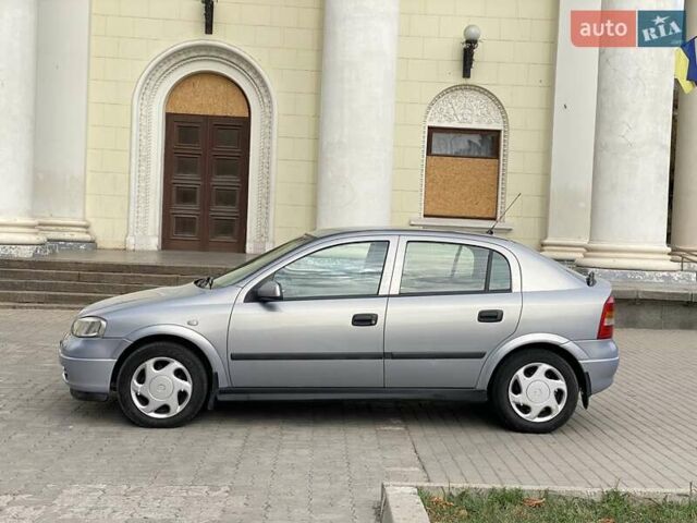 Серый Опель Астра, объемом двигателя 1.2 л и пробегом 3 тыс. км за 3150 $, фото 6 на Automoto.ua