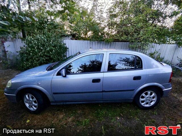 Серый Опель Астра, объемом двигателя 1.6 л и пробегом 180 тыс. км за 4730 $, фото 1 на Automoto.ua