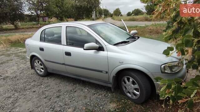 Серый Опель Астра, объемом двигателя 1.6 л и пробегом 239 тыс. км за 3800 $, фото 2 на Automoto.ua