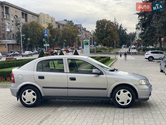 Серый Опель Астра, объемом двигателя 1.2 л и пробегом 3 тыс. км за 3150 $, фото 5 на Automoto.ua