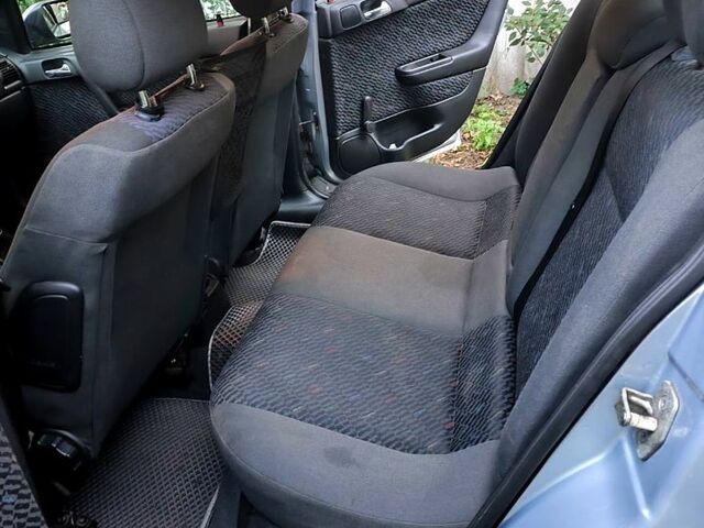 Серый Опель Астра, объемом двигателя 1.6 л и пробегом 180 тыс. км за 4730 $, фото 5 на Automoto.ua