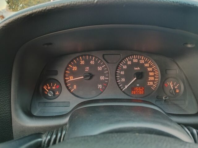 Серый Опель Астра, объемом двигателя 1.6 л и пробегом 288 тыс. км за 3900 $, фото 11 на Automoto.ua