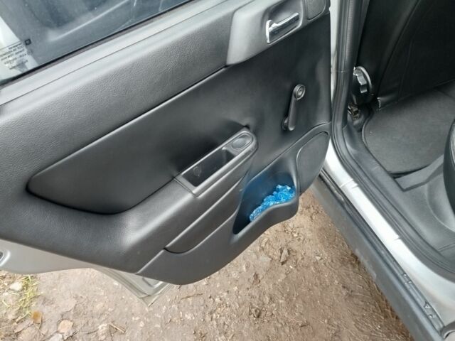 Серый Опель Астра, объемом двигателя 1.2 л и пробегом 249 тыс. км за 2400 $, фото 7 на Automoto.ua