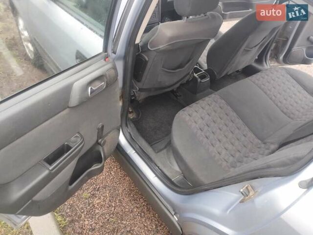 Сірий Опель Астра, об'ємом двигуна 2 л та пробігом 407 тис. км за 3100 $, фото 10 на Automoto.ua