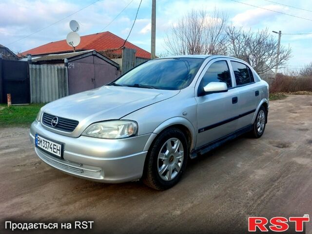 Серый Опель Астра, объемом двигателя 1.6 л и пробегом 230 тыс. км за 2000 $, фото 2 на Automoto.ua