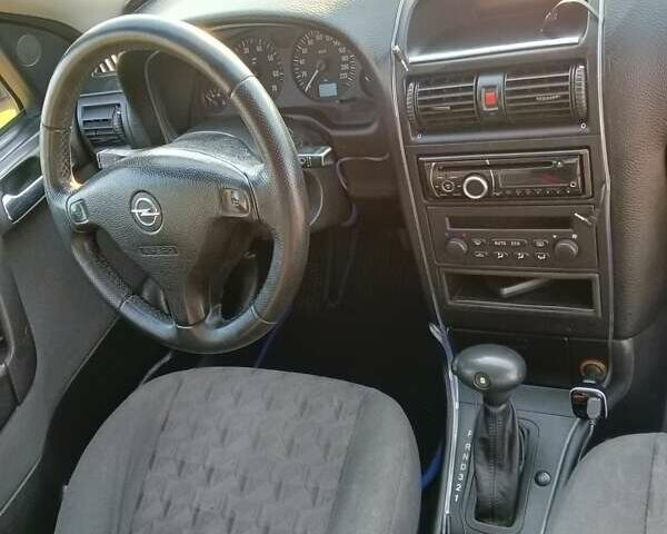 Серый Опель Астра, объемом двигателя 1.4 л и пробегом 281 тыс. км за 3700 $, фото 7 на Automoto.ua