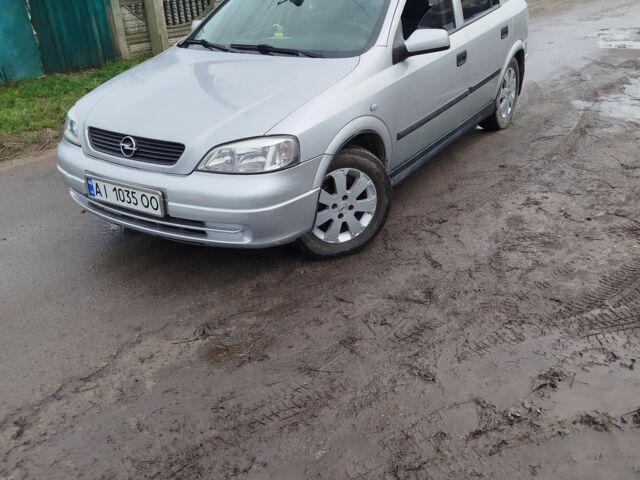 Серый Опель Астра, объемом двигателя 1.2 л и пробегом 249 тыс. км за 2400 $, фото 5 на Automoto.ua