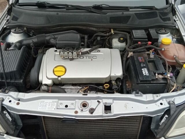 Серый Опель Астра, объемом двигателя 1.6 л и пробегом 300 тыс. км за 1950 $, фото 6 на Automoto.ua