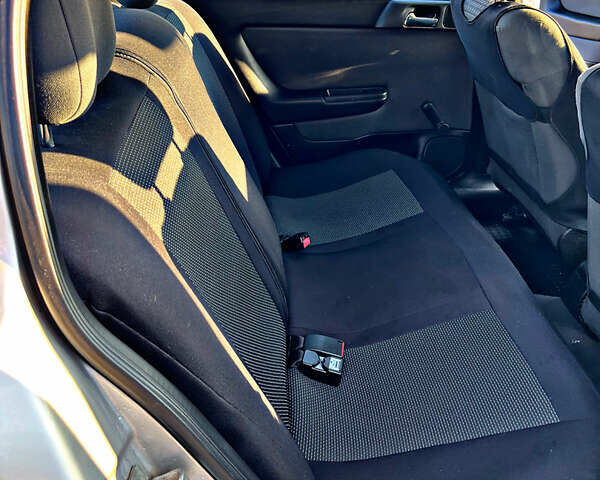 Серый Опель Астра, объемом двигателя 1.6 л и пробегом 110 тыс. км за 2800 $, фото 42 на Automoto.ua