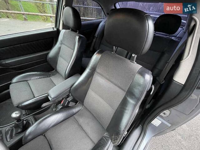 Серый Опель Астра, объемом двигателя 2 л и пробегом 185 тыс. км за 6800 $, фото 11 на Automoto.ua