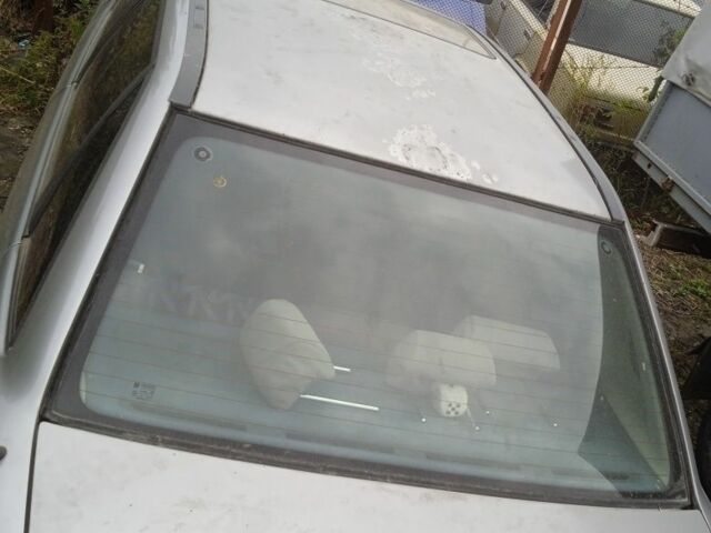 Серый Опель Астра, объемом двигателя 0 л и пробегом 230 тыс. км за 450 $, фото 3 на Automoto.ua