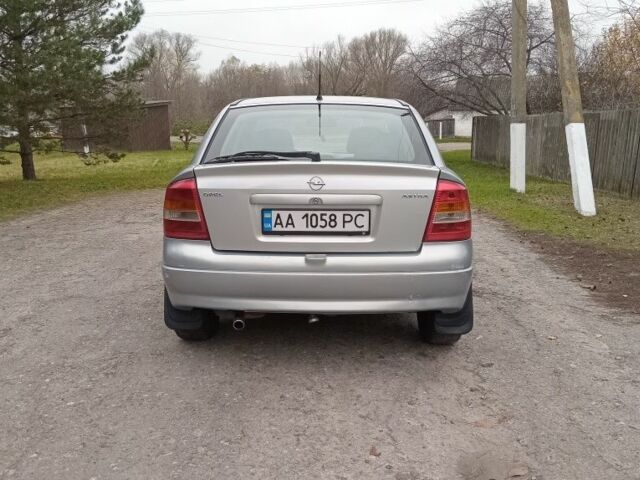 Серый Опель Астра, объемом двигателя 1.6 л и пробегом 300 тыс. км за 1950 $, фото 2 на Automoto.ua