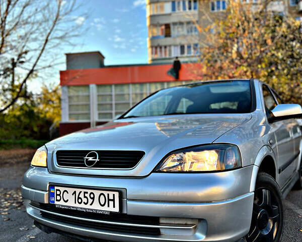 Серый Опель Астра, объемом двигателя 1.6 л и пробегом 110 тыс. км за 2800 $, фото 4 на Automoto.ua