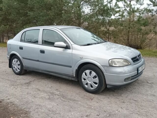 Серый Опель Астра, объемом двигателя 1.6 л и пробегом 300 тыс. км за 1950 $, фото 4 на Automoto.ua