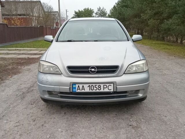 Серый Опель Астра, объемом двигателя 1.6 л и пробегом 300 тыс. км за 1950 $, фото 5 на Automoto.ua