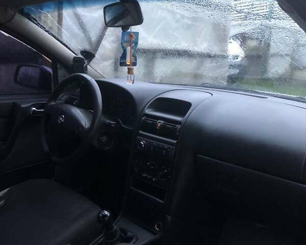 Серый Опель Астра, объемом двигателя 1.6 л и пробегом 281 тыс. км за 1900 $, фото 1 на Automoto.ua