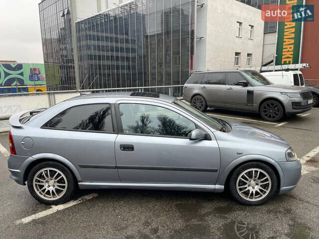 Серый Опель Астра, объемом двигателя 2 л и пробегом 185 тыс. км за 6800 $, фото 21 на Automoto.ua