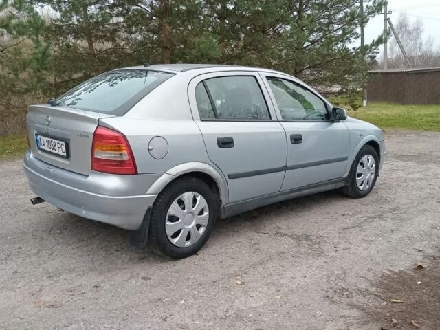 Серый Опель Астра, объемом двигателя 1.6 л и пробегом 300 тыс. км за 1950 $, фото 3 на Automoto.ua