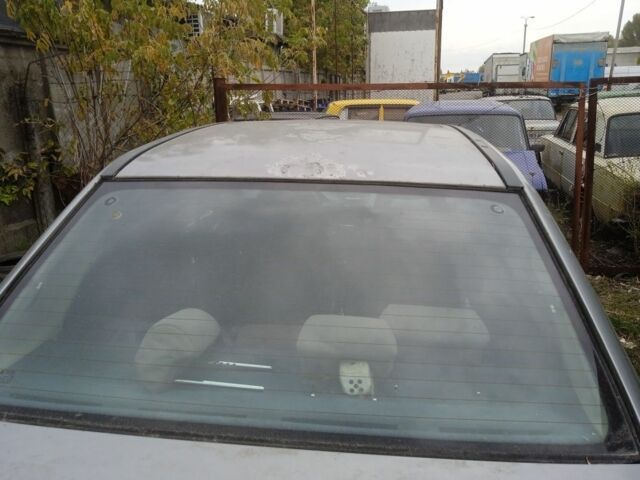 Серый Опель Астра, объемом двигателя 0 л и пробегом 230 тыс. км за 450 $, фото 5 на Automoto.ua