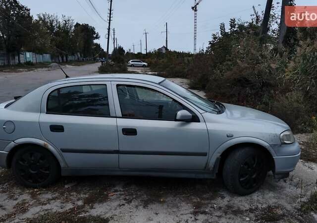 Серый Опель Астра, объемом двигателя 1.6 л и пробегом 289 тыс. км за 1849 $, фото 1 на Automoto.ua