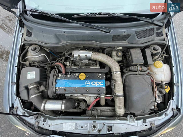 Серый Опель Астра, объемом двигателя 2 л и пробегом 185 тыс. км за 6800 $, фото 5 на Automoto.ua