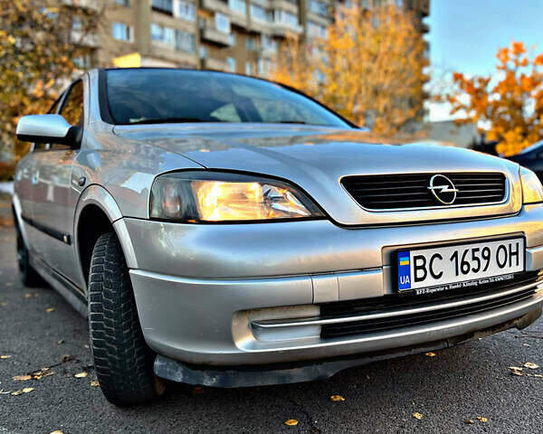 Серый Опель Астра, объемом двигателя 1.6 л и пробегом 110 тыс. км за 2800 $, фото 5 на Automoto.ua