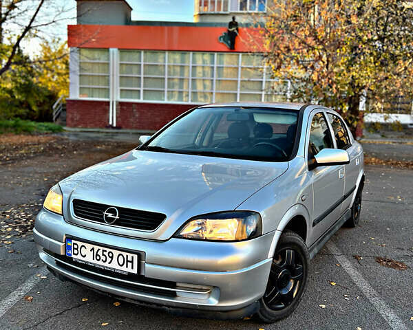 Серый Опель Астра, объемом двигателя 1.6 л и пробегом 110 тыс. км за 2800 $, фото 2 на Automoto.ua