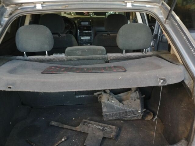 Серый Опель Астра, объемом двигателя 2 л и пробегом 245 тыс. км за 1200 $, фото 4 на Automoto.ua