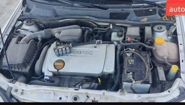 Серый Опель Астра, объемом двигателя 1.6 л и пробегом 254 тыс. км за 2050 $, фото 5 на Automoto.ua